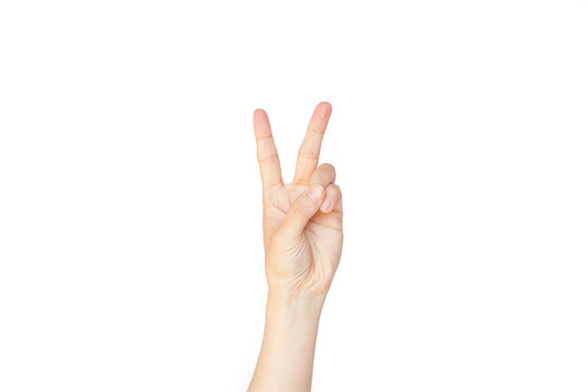 Japanese hand gesture: Number two on isolated white background