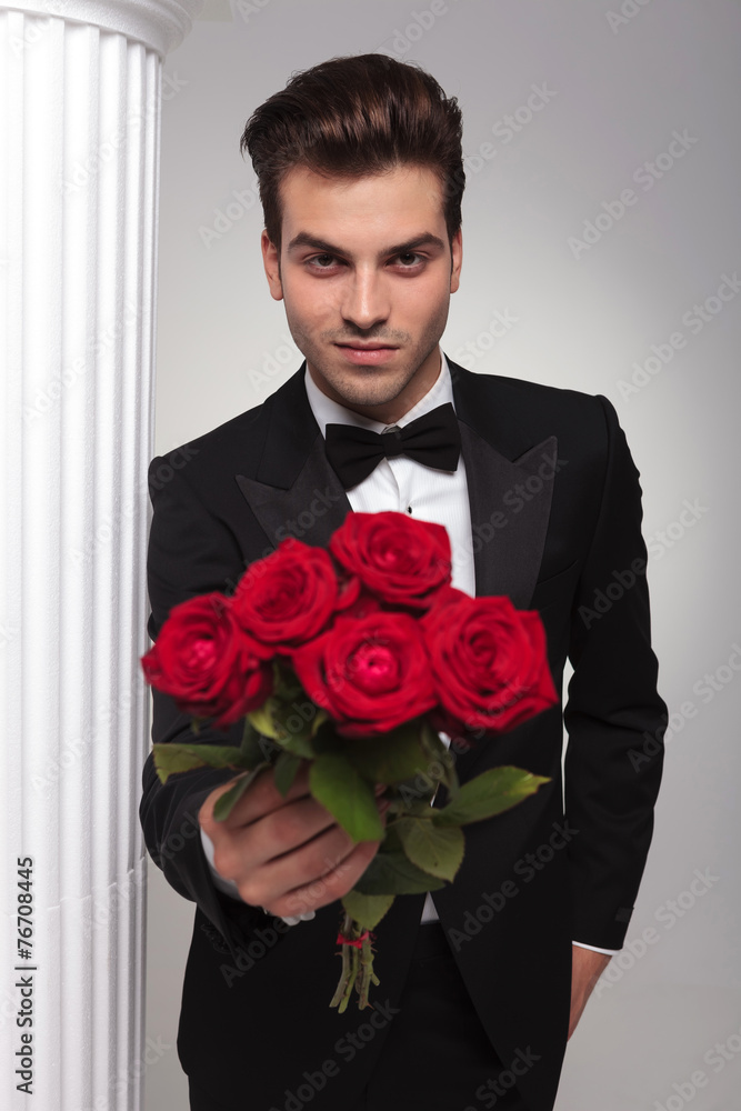 Sticker business man giving you a bouquet of red roses