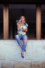 Young woman portrait blowing soap bubbles