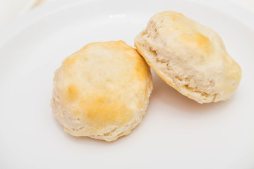 Two Fresh Biscuits on White Plate