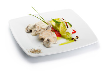 Plate with chicken and mushrooms stew with vegetables