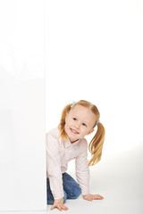 Beautiful little girl with white copy space on a white backgroun