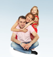 Charming little girl hugging their parents.