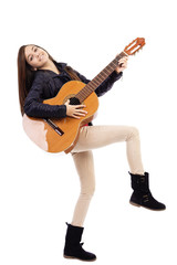 Obraz premium Full length portrait of happy teenage girl playing guitar