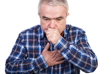 Senior man coughing and accusing chest pain