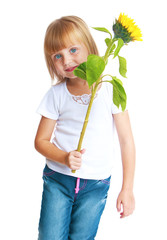 Cute little girl holding a flower sunflower.