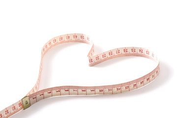 A measuring tape shaping a heart