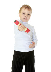 Boy with dumbbells in hand.