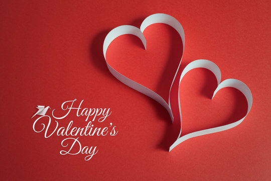 valentines day background with origami dove and papercraft heart