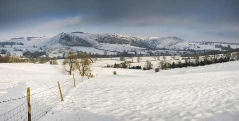 Beautiful panorama Winter landscape of snow covered countryside