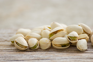 Pistachios on wood