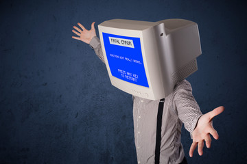 Person with a monitor head and fatal error blue screen on the di