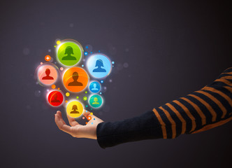 Social network icons in the hand of a woman