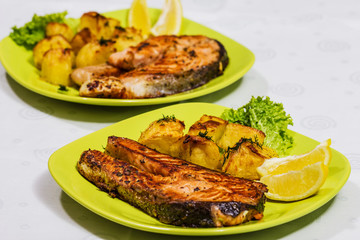 Grilled Salmon with Salad, lemon and potatoes