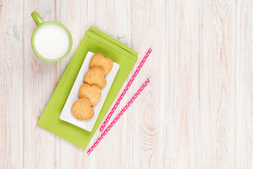 Cup of milk and heart shaped cookies