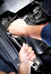 Mechanic working in auto repair garage