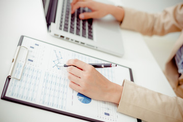 woman hand with business report