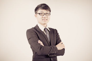 Successful young business man of Asian, full length portrait iso