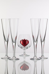 Different glasses and red heart