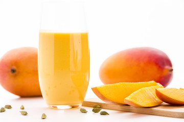 Cut Mango Pieces, Cardamon And Fruit Shake