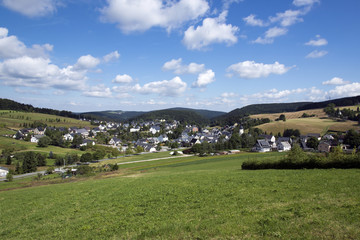Fototapeta na wymiar Landscape view of a village with blue skies