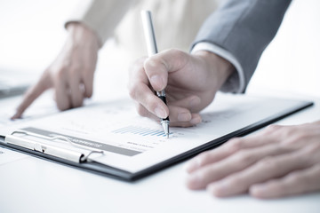 Business people discussing the charts and graphs showing the res