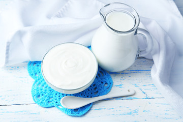 Dairy products on wooden table background