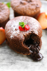 Hot chocolate pudding with fondant centre, close-up