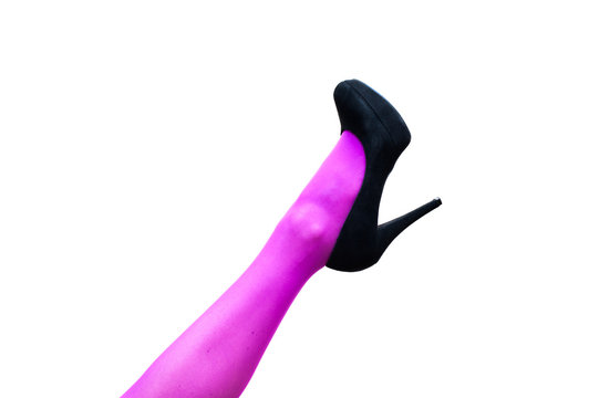 Female leg in pink pantyhose and black high heels