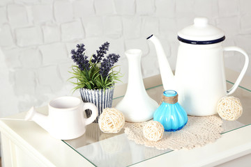 Fototapeta na wymiar Interior with decorative vases and plant