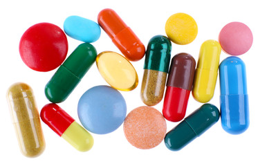 Different colorful pills isolated on white background