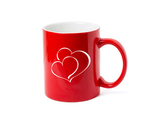 Red cup with hearts. Isolated on white