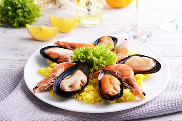 Seafood Paella on plate on table close-up