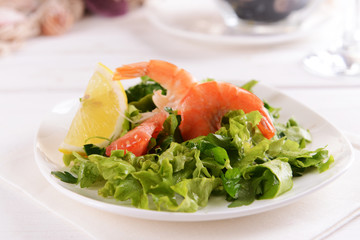 Tasty seafood on plate on table close-up