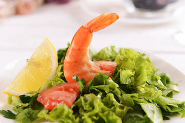 Tasty seafood on plate on table close-up