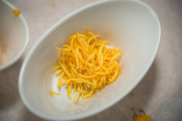 close up of a bowl of orange zest