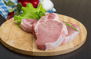 Raw t-bone steak