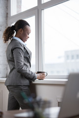 Business woman enjoying the coffee break