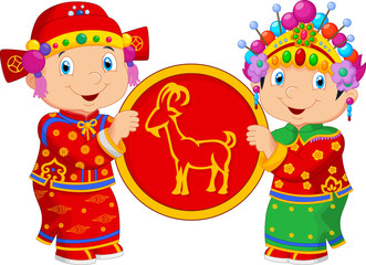Obraz na płótnie Canvas Cartoon Chinese kids holding goat symbol