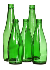 Five green glass bottles isolated on white background