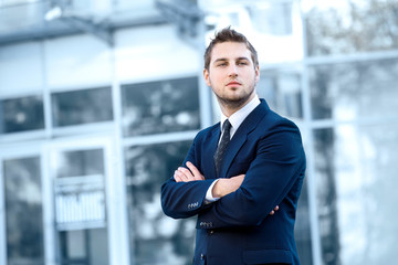 Proud Businessman In Front Of His Office