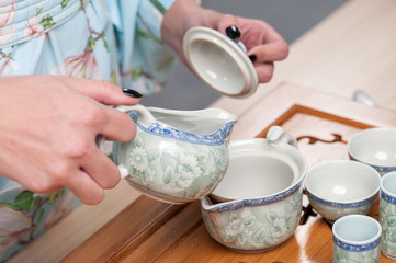 Asian beauty getting ready for tea ceremony
