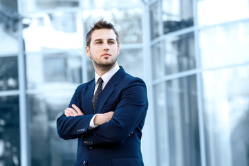 Proud Businessman In Front Of His Office