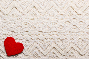  Red heart love symbol on lace background