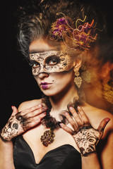 Girl in masquerade mask