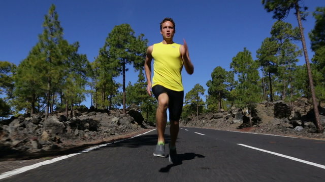 Running runner man sprinting for success fast at speed