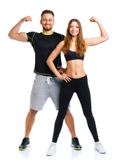 Athletic man and woman after fitness exercise on the white