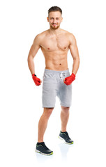Fototapeta premium Athletic attractive man wearing boxing bandages on the white