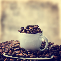 Coffee cup and coffee beans