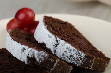 Chocolate cake with strawberries and grapes